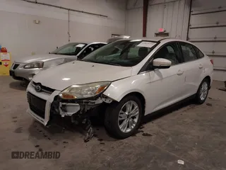2012 Ford Focus SEL with VIN 1FAHP3H22CL178118, listed as a IAAI auction lot 42013759 with 183,481 mi miles and . Bid and sale history available at carsss.com. Image 2.