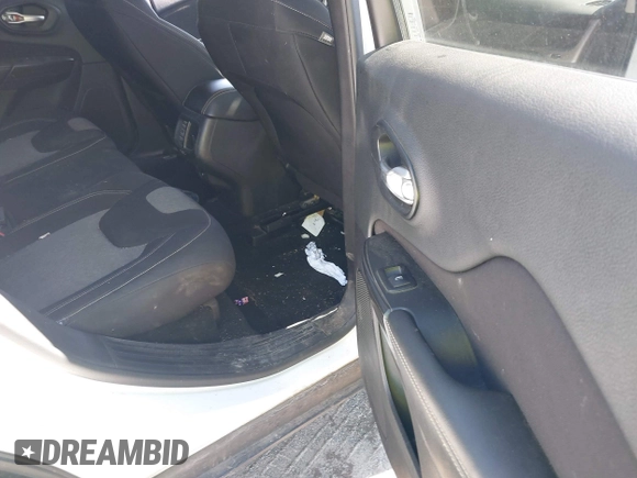 2014 Jeep Cherokee Latitude with VIN 1C4PJMCS9EW309289, listed as a IAAI auction lot 42003252 with 99,360 mi miles and . Bid and sale history available at DreamBid. Image 8.