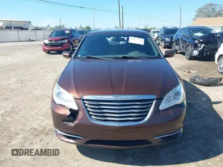2013 Chrysler 200 Touring with VIN 1C3CCBBB9DN550812, listed as a IAAI auction lot 41677254 with 172,873 mi miles and . Bid and sale history available at carsss.com. Image 12.