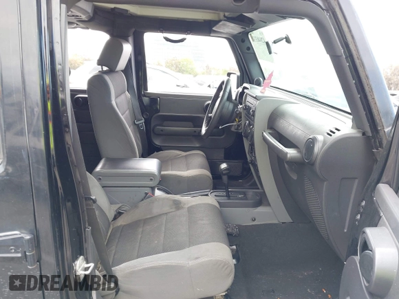 2007 Jeep Wrangler Unlimited X with VIN 1J4GB391X7L172965, listed as a IAAI auction lot 42040337 with 170,482 mi miles and . Bid and sale history available at DreamBid. Image 5.
