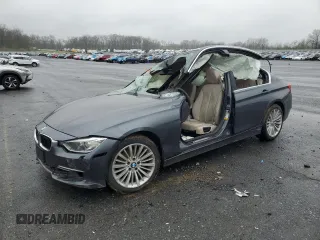 2015 BMW 3 Series 328i xDrive with VIN WBA3B3C54FF548554, listed as a Copart auction lot 52165095 with 0 mi miles and Salvage Title. Bid and sale history available at carsss.com. Image 1.