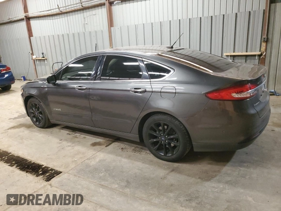 2017 Ford Fusion Hybrid SE z VIN 3FA6P0LU4HR226127, wystawiony jako Copart lot #50496455 z przebiegiem 98 027 mil mil oraz Szkoda całkowita • Salvage title. Historia ofert i sprzedaży dostępna na DreamBid. Obrazek 2.
