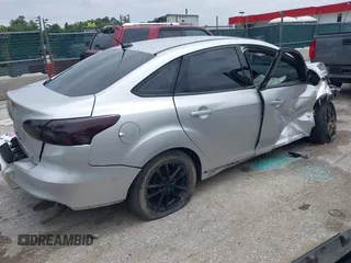 2016 Ford Focus SE z VIN 1FADP3F22GL373756, wystawiony jako IAAI lot #42369795 z przebiegiem 99 646 mil mil oraz . Historia ofert i sprzedaży dostępna na DreamBid. Obrazek 4.