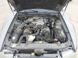 2001 Ford Mustang Deluxe z VIN 1FAFP44411F159656, wystawiony jako IAAI lot #42123128 z przebiegiem 191 814 mil mil oraz . Historia ofert i sprzedaży dostępna na DreamBid. Obrazek 18.