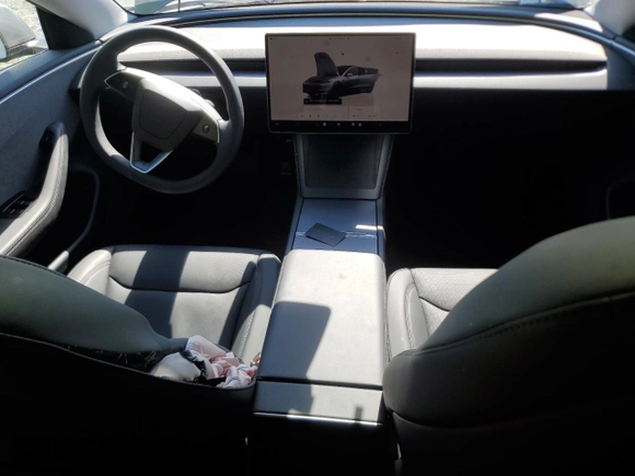 2025 Tesla Model 3 Long Range with VIN 5YJ3E1EA7SF994768, listed as a Copart auction lot 57649615 with 611 mi miles and Salvage title. Bid and sale history available at DreamBid. Image 8.