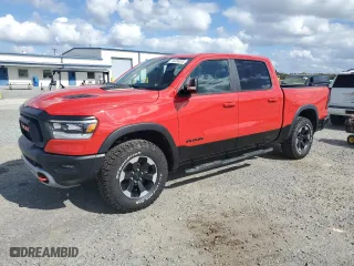 2019 Ram 1500 Rebel with VIN 1C6SRFLTXKN551282, listed as a Copart auction lot 74424024 with 124,003 mi miles and Salvage Title. Bid and sale history available at carsss.com. Image 1.