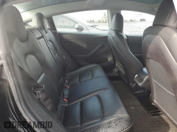 2019 Tesla Model 3 Mid Range with VIN 5YJ3E1EA1KF397390, listed as a Copart auction lot 49862915 with 63,698 mi miles and Salvage Title. Bid and sale history available at carsss.com. Image 10.