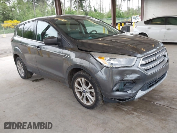 2017 Ford Escape SE z VIN 1FMCU9G93HUC97081, wystawiony jako IAAI lot #42327866 z przebiegiem 97 580 mil mil oraz . Historia ofert i sprzedaży dostępna na DreamBid. Obrazek 1.