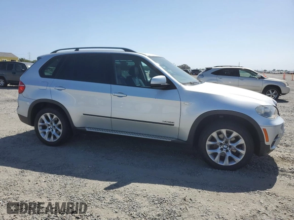 2012 BMW X5 35i with VIN 5UXZV4C5XCL751020, listed as a Copart auction lot 59327845 with 106,249 mi miles and Salvage title. Bid and sale history available at DreamBid. Image 4.