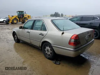 1997 Mercedes-Benz C with VIN WDBHA28E3VF530316, listed as a Copart auction lot 85938384 with 169,664 mi miles and Salvage Title. Bid and sale history available at carsss.com. Image 2.