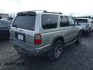 1999 Toyota 4Runner SR5 z VIN JT3HN86R0X0196528, wystawiony jako IAAI lot #41666499 z przebiegiem 294 216 mil mil oraz . Historia ofert i sprzedaży dostępna na DreamBid. Obrazek 4.