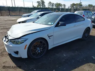 2019 BMW M4 with VIN WBS4Y9C5XKAG67446, listed as a IAAI auction lot 41669865 with 103,230 mi miles. Bid and sale history available at carsss.com. Image 19.