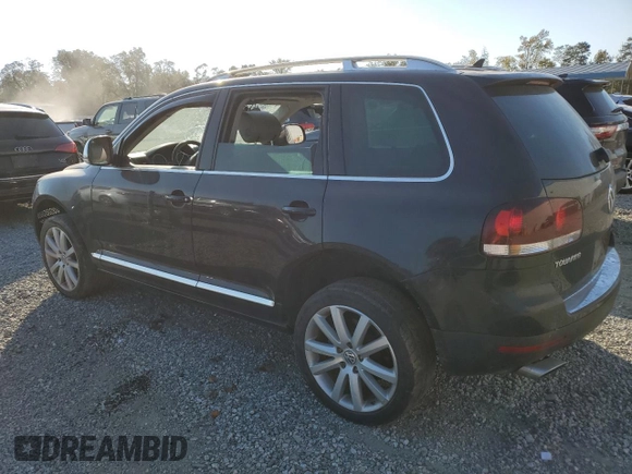 2010 Volkswagen Touareg VR6 with VIN WVGBF7A92AD002237, listed as a Copart auction lot 73919754 with 124,072 mi miles and Salvage Title. Bid and sale history available at DreamBid. Image 2.
