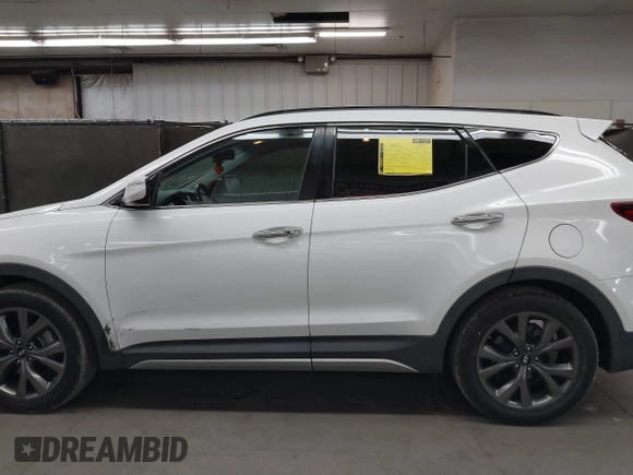 2017 Hyundai Santa Fe Ultimate with VIN 5NMZW4LA0HH040141, listed as a IAAI auction lot 42603243 with 140,817 mi miles and . Bid and sale history available at DreamBid. Image 14.