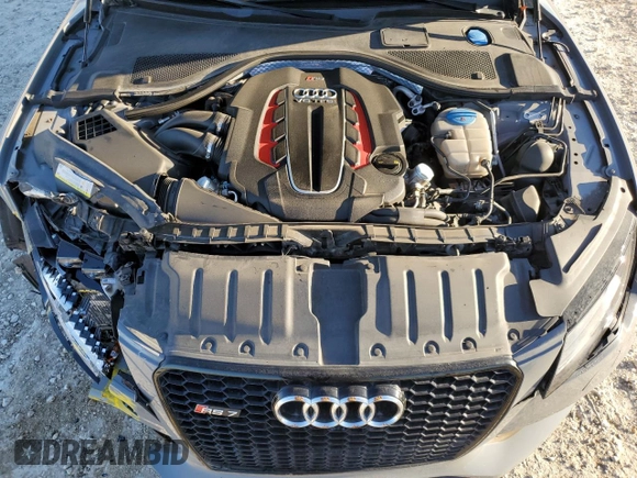 2015 Audi RS 7 Prestige z VIN WUAW2AFC7FN901067, wystawiony jako Copart lot #84822874 z przebiegiem 85 329 mil mil oraz Szkoda całkowita • Salvage title. Historia ofert i sprzedaży dostępna na DreamBid. Obrazek 11.