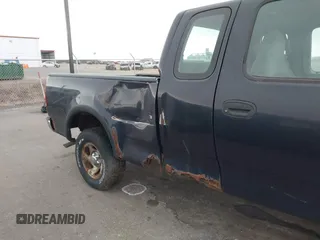 1999 Ford F-150 with VIN 1FTRX18W2XNA90069, listed as a IAAI auction lot 41496543 with 115,787 mi miles and . Bid and sale history available at DreamBid. Image 6.