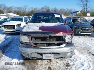2003 Ford F-150 XL with VIN 1FTRX18L33NB00026, listed as a IAAI auction lot 41608554 with 161,877 mi miles. Bid and sale history available at carsss.com. Image 12.
