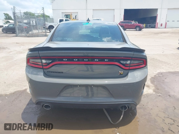 2019 Dodge Charger Scat Pack with VIN 2C3CDXGJ2KH633854, listed as a IAAI auction lot 42212517 with 74,285 mi miles and . Bid and sale history available at DreamBid. Image 16.