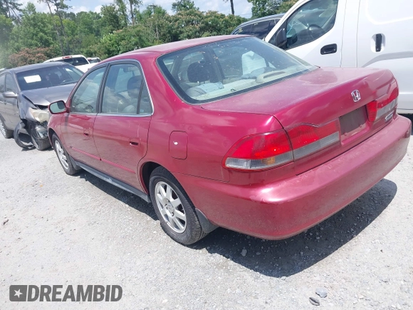 2002 Honda Accord SE z VIN 1HGCG56712A020105, wystawiony jako IAAI lot #42504254 z przebiegiem 317 533 mil mil oraz . Historia ofert i sprzedaży dostępna na DreamBid. Obrazek 3.