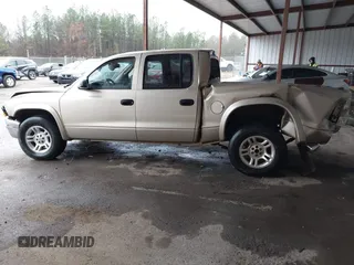 2003 Dodge Dakota SLT with VIN 1D7HL48N93S303911, listed as a IAAI auction lot 41536555 with 383,306 mi miles. Bid and sale history available at carsss.com. Image 15.