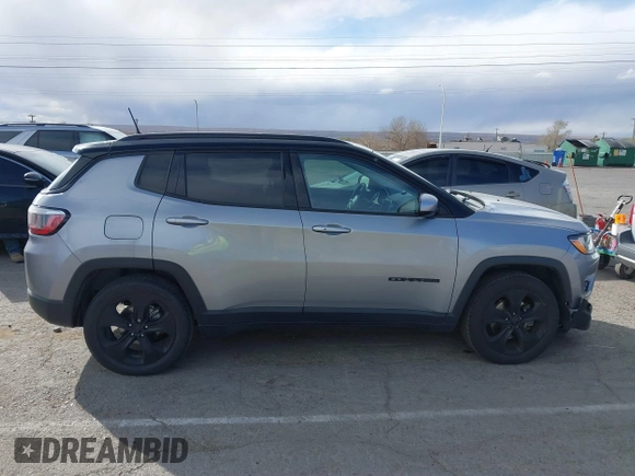 2020 Jeep Compass Latitude with VIN 3C4NJCBBXLT158887, listed as a IAAI auction lot 41752495 with 95,429 mi miles and . Bid and sale history available at DreamBid. Image 13.