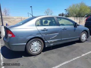 2010 Honda Civic Hybrid with VIN JHMFA3F29AS005350, listed as a IAAI auction lot 41966454 with 145,058 mi miles. Bid and sale history available at carsss.com. Image 6.