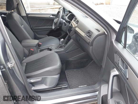 2023 Volkswagen Tiguan SE with VIN 3VVNB7AX4PM042409, listed as a IAAI auction lot 42627800 with 29,016 mi miles and . Bid and sale history available at DreamBid. Image 5.