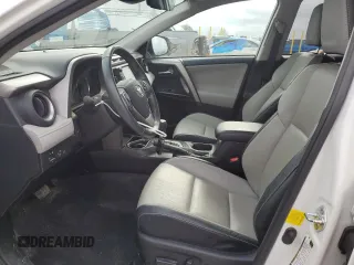2016 Toyota RAV4 Limited with VIN 2T3DFREVXGW495077, listed as a Copart auction lot 55533505 with 122,483 mi miles and Salvage title. Bid and sale history available at DreamBid. Image 7.
