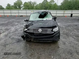 2023 Volkswagen Tiguan SE with VIN 3VVMB7AX3PM021515, listed as a Copart auction lot 57981775 with 23,885 mi miles and Salvage title. Bid and sale history available at DreamBid. Image 14.