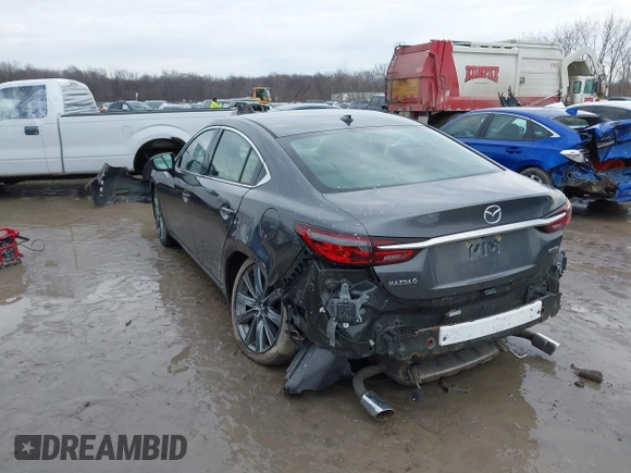 2020 Mazda 6 Grand Touring with VIN JM1GL1TYXL1524543, listed as a IAAI auction lot 41474337 with 52,160 mi miles and . Bid and sale history available at DreamBid. Image 3.