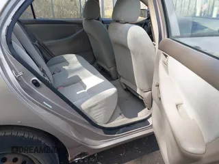 2003 Toyota Corolla CE with VIN 1NXBR32E23Z111392, listed as a IAAI auction lot 42054042 with 129,332 mi miles and . Bid and sale history available at DreamBid. Image 8.