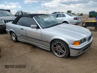 1998 BMW 3 Series 323i with VIN WBABJ8332WEM22760, listed as a Copart auction lot 59631805 with 77,300 mi miles and Salvage title. Bid and sale history available at DreamBid. Image 4.