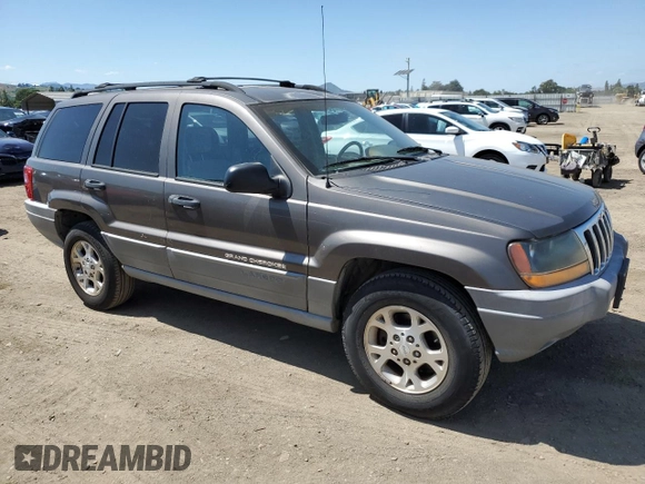 2000 Jeep Grand Cherokee Laredo with VIN 1J4G248S6YC333068, listed as a Copart auction lot 54972765 with 183,775 mi miles and Clean title. Bid and sale history available at DreamBid. Image 4.