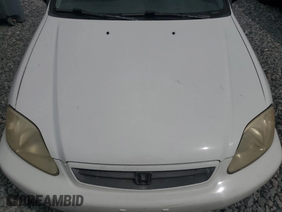 1999 Honda Civic DX with VIN 1HGEJ6223XL076584, listed as a Copart auction lot 51202925 with 282,306 mi miles and Salvage Title. Bid and sale history available at DreamBid. Image 11.