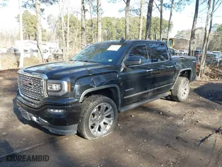 2018 GMC Sierra 1500 Denali with VIN 3GTU2PEJ5JG308087, listed as a IAAI auction lot 41343443 with 108,644 mi miles. Bid and sale history available at carsss.com. Image 2.