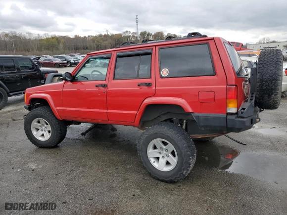 2001 Jeep Cherokee Sport with VIN 1J4FF48S61L568043, listed as a Copart auction lot 80671554 with 244,660 mi miles and Salvage Title. Bid and sale history available at carsss.com. Image 2.
