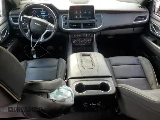 2023 Chevrolet Suburban Premier z VIN 1GNSCFKD0PR504435, wystawiony jako Copart lot #60309665 z przebiegiem 50 744 mil mil oraz Czysty tytuł • Clean title. Historia ofert i sprzedaży dostępna na DreamBid. Obrazek 8.