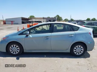 2014 Toyota Prius with VIN JTDKN3DP4E3055544, listed as a IAAI auction lot 42553870 with 94,335 mi miles and . Bid and sale history available at DreamBid. Image 14.