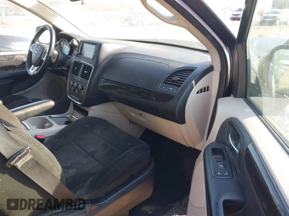2013 Dodge Grand Caravan SXT with VIN 2C4RDGCG4DR602893, listed as a IAAI auction lot 41747242 with 206,213 mi miles and . Bid and sale history available at DreamBid. Image 5.