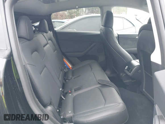 2025 Tesla Model Y Long Range with VIN 7SAYGDEDXSA349480, listed as a IAAI auction lot 41492740 with 1,486 mi miles and . Bid and sale history available at DreamBid. Image 8.