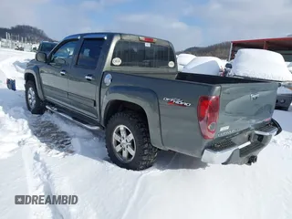 2010 GMC Canyon SLE1 with VIN 1GTJTCDE6A8127051, listed as a IAAI auction lot 41366245 with 147,516 mi miles. Bid and sale history available at carsss.com. Image 3.