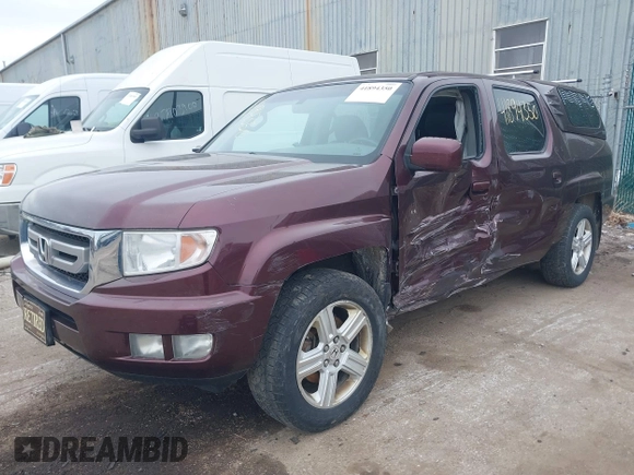 2011 Honda Ridgeline RTL with VIN 5FPYK1F51BB007959, listed as a IAAI auction lot 41894350 with 186,926 mi miles. Bid and sale history available at carsss.com. Image 17.