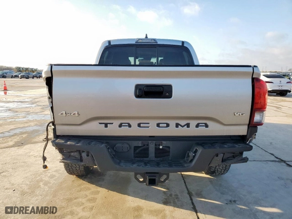 2021 Toyota Tacoma 4WD SR with VIN 5TFCZ5AN4MX256407, listed as a Copart auction lot 46923005 with 69,793 mi miles and Salvage Title. Bid and sale history available at carsss.com. Image 6.