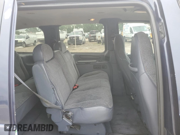 1998 Ford Windstar LX with VIN 2FMZA5146WBC36500, listed as a Copart auction lot 57662025 with 143,017 mi miles and Salvage title. Bid and sale history available at DreamBid. Image 11.