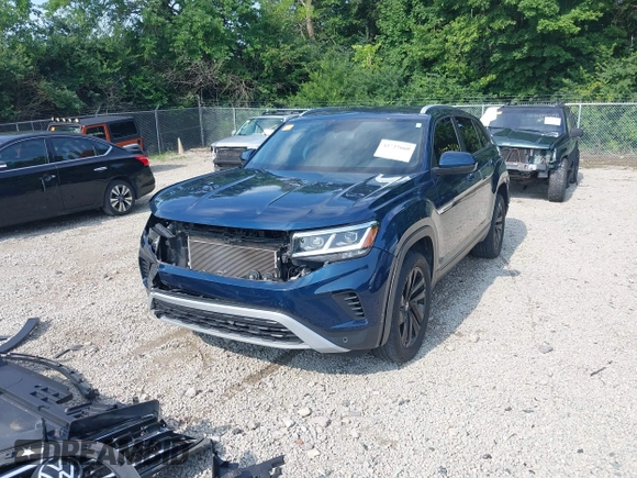 2022 Volkswagen Atlas SE z VIN 1V2HE2CA7NC211835, wystawiony jako IAAI lot #42722660 z przebiegiem 56 112 mil mil oraz . Historia ofert i sprzedaży dostępna na DreamBid. Obrazek 2.