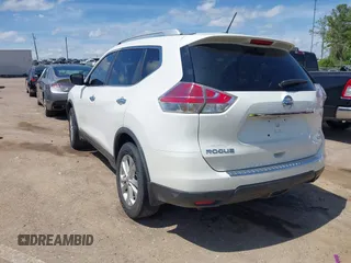 2016 Nissan Rogue SV with VIN KNMAT2MT2GP633600, listed as a IAAI auction lot 39191100 with 128,051 mi miles and . Bid and sale history available at DreamBid. Image 3.