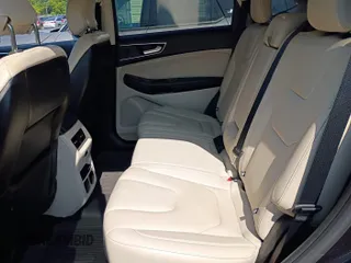 2019 Ford Edge Titanium with VIN 2FMPK4K91KBC09840, listed as a IAAI auction lot 42870883 with 118,778 mi miles and . Bid and sale history available at DreamBid. Image 29.