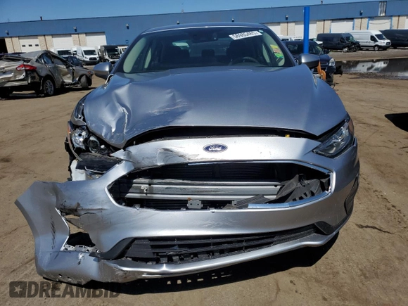 2020 Ford Fusion SE z VIN 3FA6P0T93LR179435, wystawiony jako Copart lot #56985465 z przebiegiem 43 188 mil mil oraz Szkoda całkowita • Salvage title. Historia ofert i sprzedaży dostępna na DreamBid. Obrazek 5.