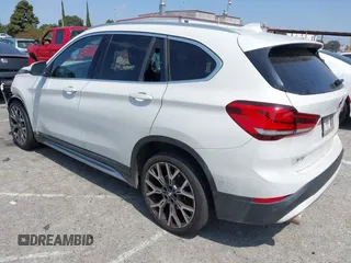 2020 BMW X1 xDrive28i with VIN WBXJG9C04L5R18165, listed as a IAAI auction lot 42313313 with 46,815 mi miles and . Bid and sale history available at DreamBid. Image 3.