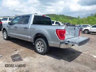 2023 Ford F-150 XL with VIN 1FTEW1C84PKD69454, listed as a IAAI auction lot 42087856 with 53,164 mi miles. Bid and sale history available at carsss.com. Image 3.